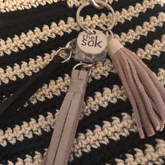 The Sak Handbags - the sak- crochet black & off white striped handbag. Cute summer bag!